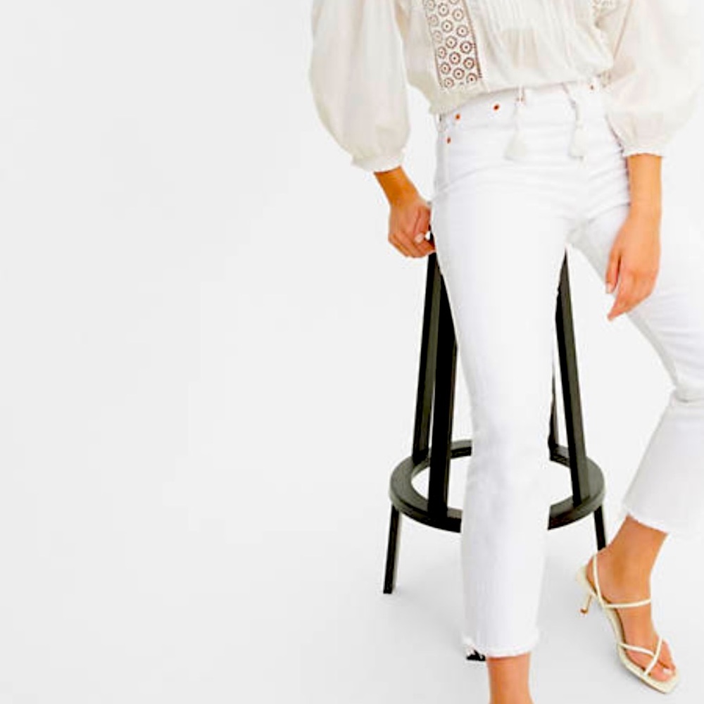 White Levi’s wedgie straight high rise jeans.